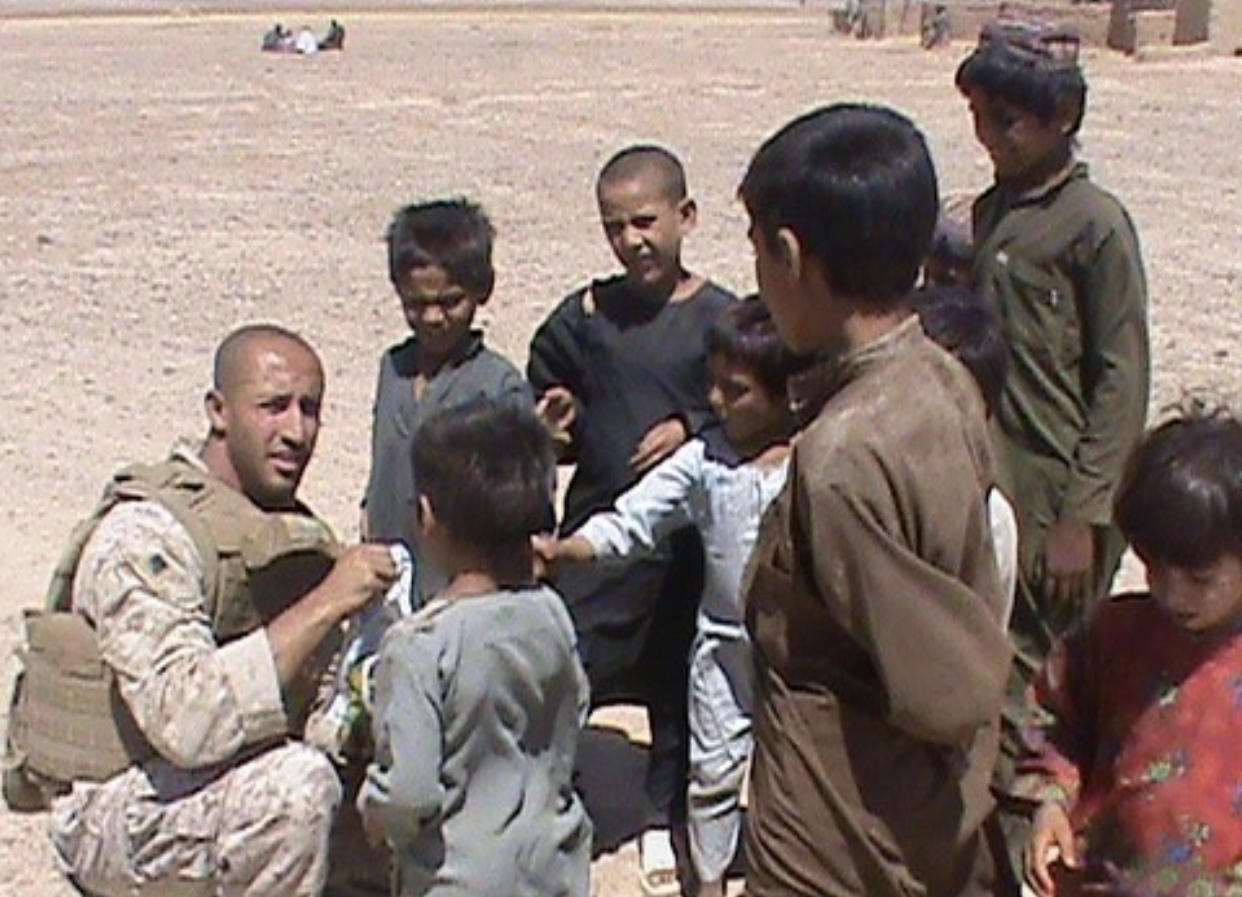 Avan in military uniform during deployment in Afghanistan